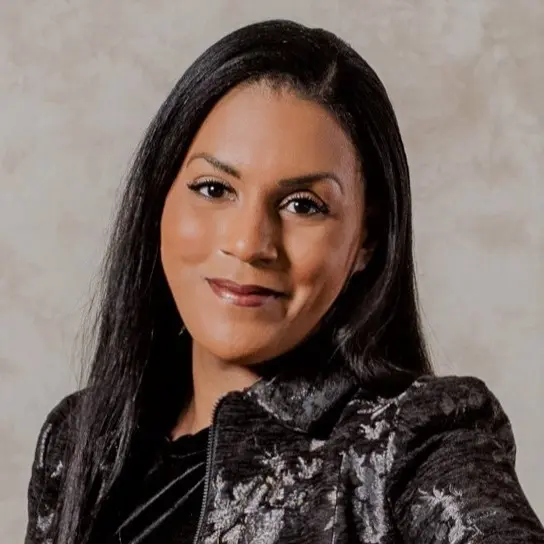 Headshot of Brenda Robinson smiling at the camera.