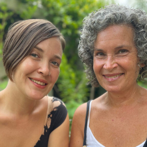 Sari González and Becka Koritz smiling at the camera.